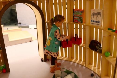 Little girl playing at the Children's Museum